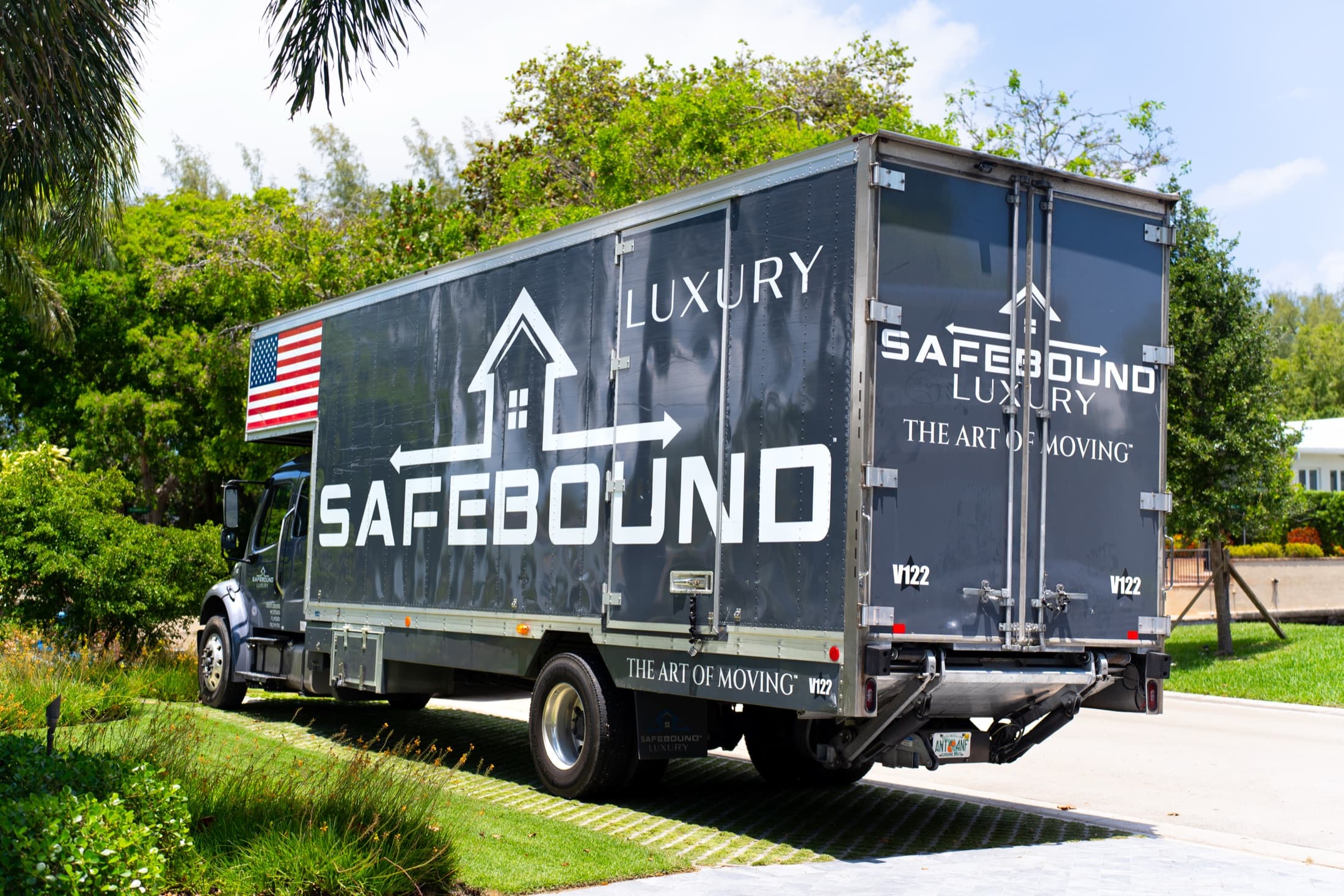 Safebound Luxury truck — The Art of Moving — at a waterfront estate